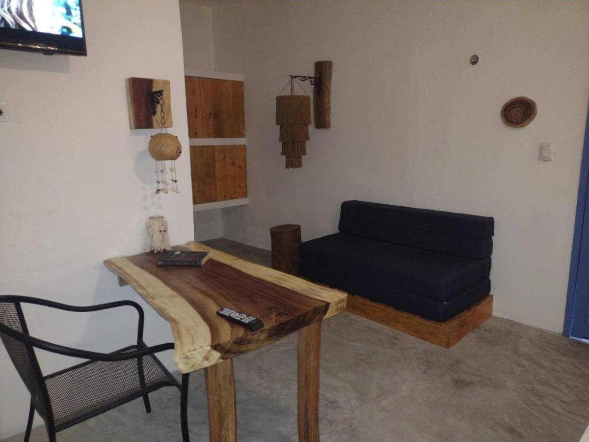 Mio Tulum Hotel Boutique 외부 사진 A living room in a hotel in Greece