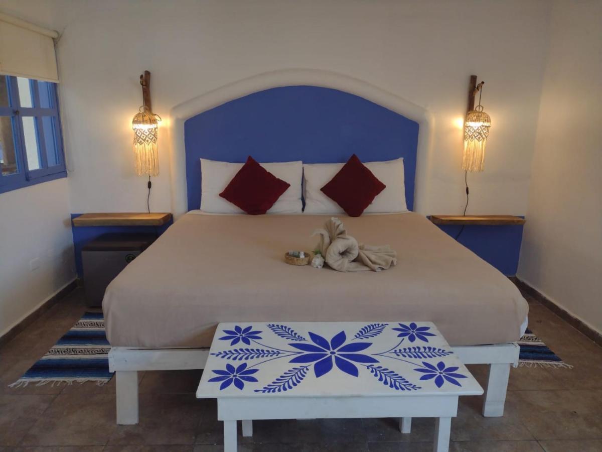 Mio Tulum Hotel Boutique 외부 사진 A bedroom in a hotel in Santorini, Greece